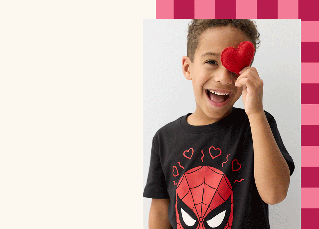 Boy holding heart